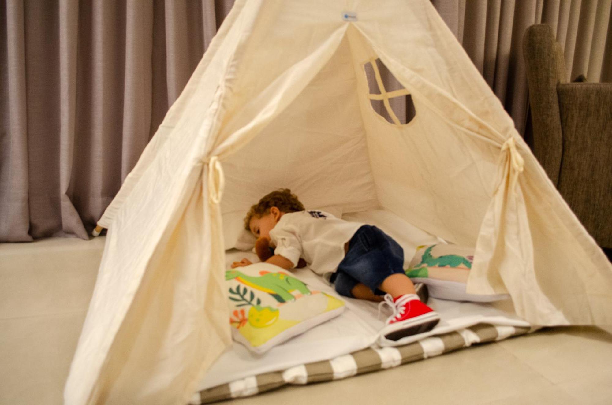 Royal Boutique Savassi Hotel بيلو هورزونتي المظهر الخارجي الصورة A child playing in a teepee