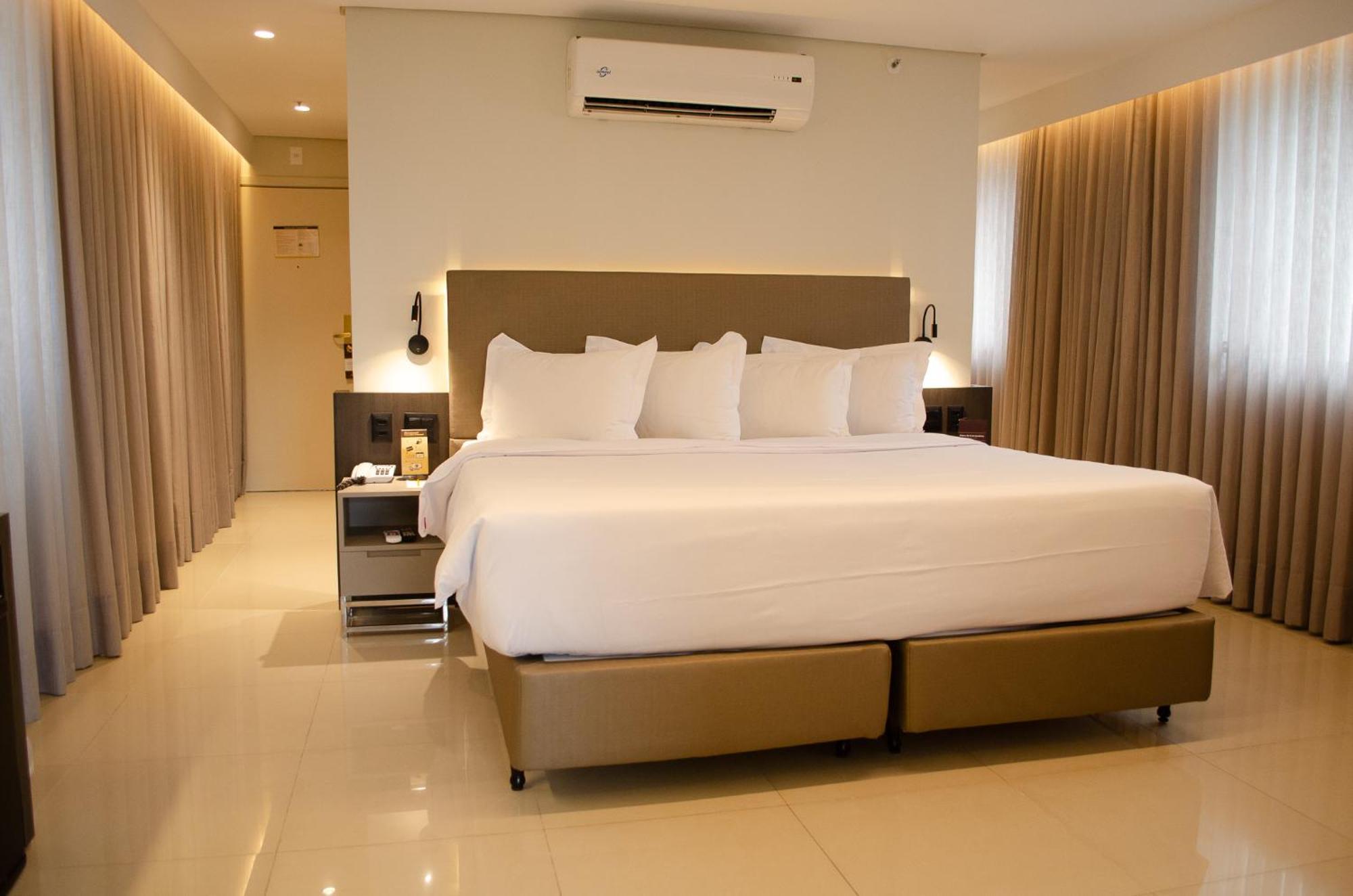 Royal Boutique Savassi Hotel بيلو هورزونتي المظهر الخارجي الصورة A bedroom at the hotel